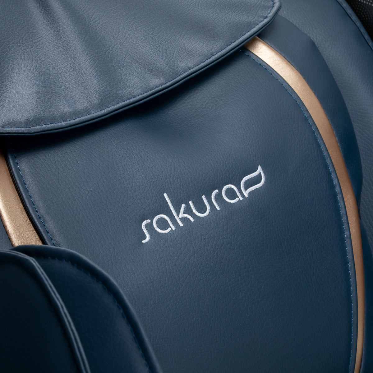 Sakura 3D Sakura Maximus 809 massage chair in grey-blue with padded armrests and ergonomic design for full-body relaxation.