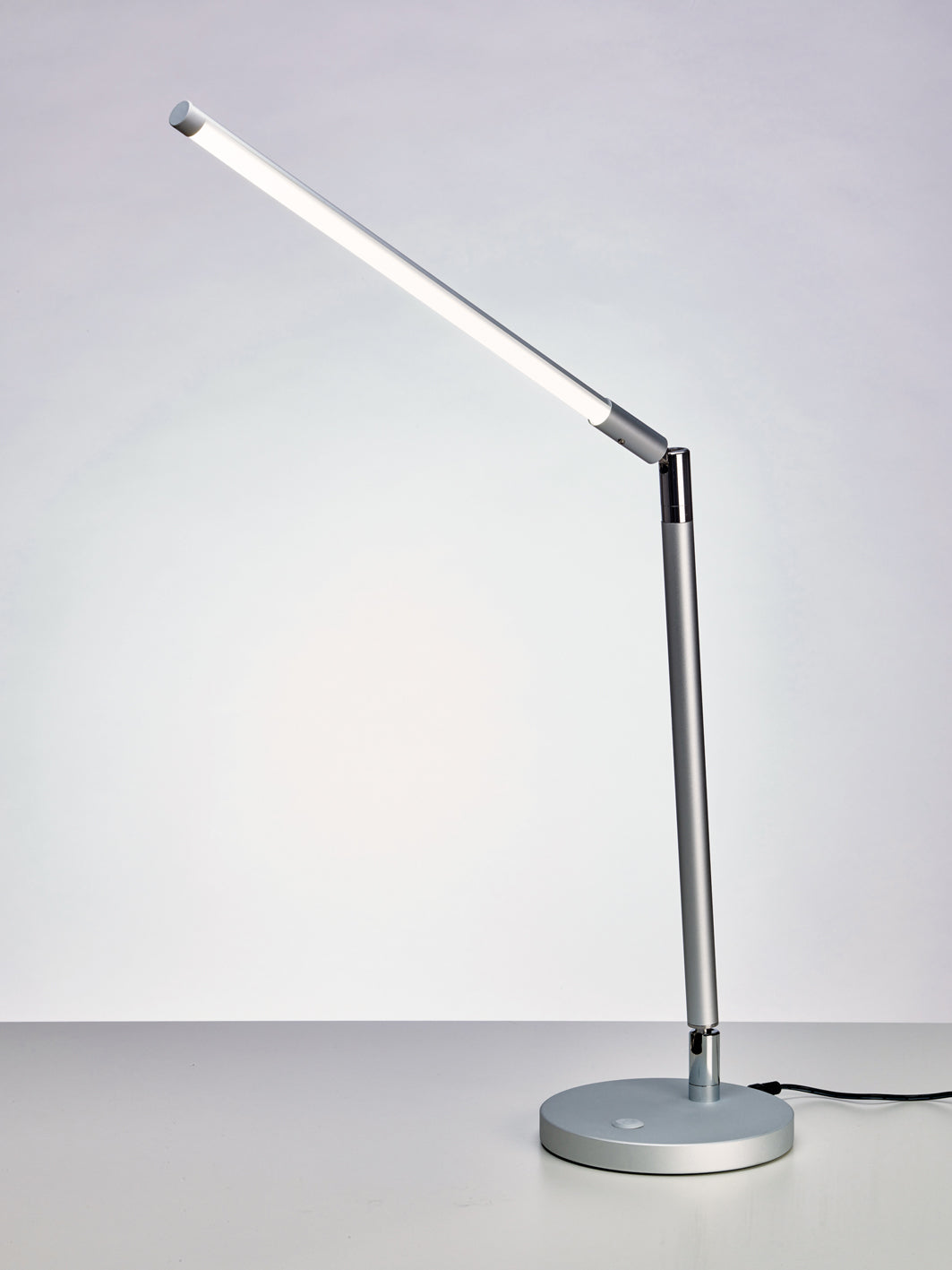 Beauty System PROMED LTL-749 LED table lamp with non-shadow lighting, modern design, and adjustable arm for targeted illumination.