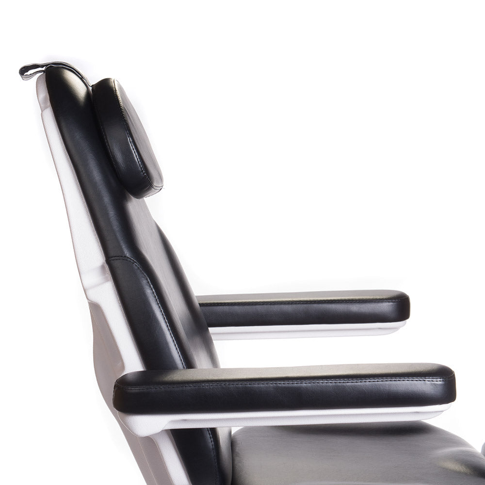 Electrical beauty chair Modena Pedi BD-8294 by Beauty System, black leather upholstery with adjustable headrest and footrest.