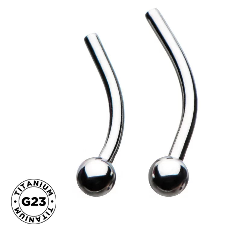 Titaanist kõver labret, mis surutakse sisse