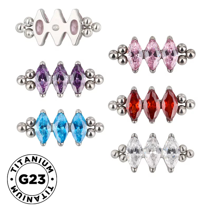 Titaanist sõrmus kolme pärliga raamiga