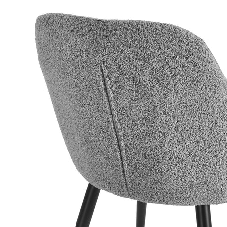Close-up of rounded backrest and armrests on 4RICO Intra grey chair