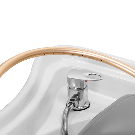 Gabbiano Head Spa 017 hair washing bed in grey with cushioned surface and adjustable headrest for comfortable hair washing.
