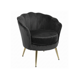 Black velvet armchair with gold legs on a white background
