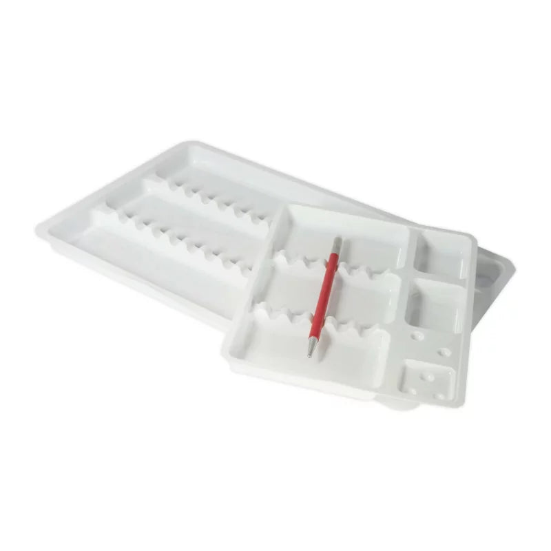 Disposable plastic instrument trays in two sizes with compartments