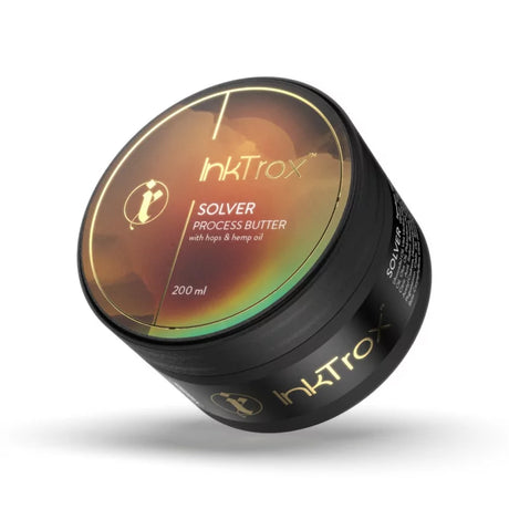 Inktrox Solver Tattoo Butter 50ml and 200ml jars, creamy skin-safe product for tattoo aftercare and healing.
