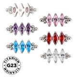 Titaanist sõrmus kolme pärliga raamiga