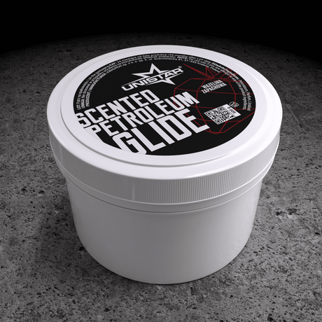 Unistar Scented White Glide Strawberry 500g jar, showing the smooth white glide with strawberry scent and label on the lid.